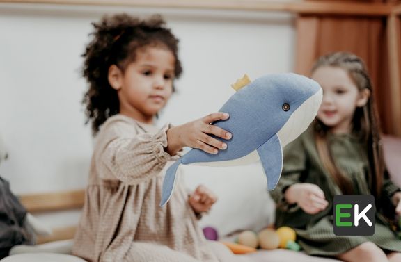 Girl child playing with a toy