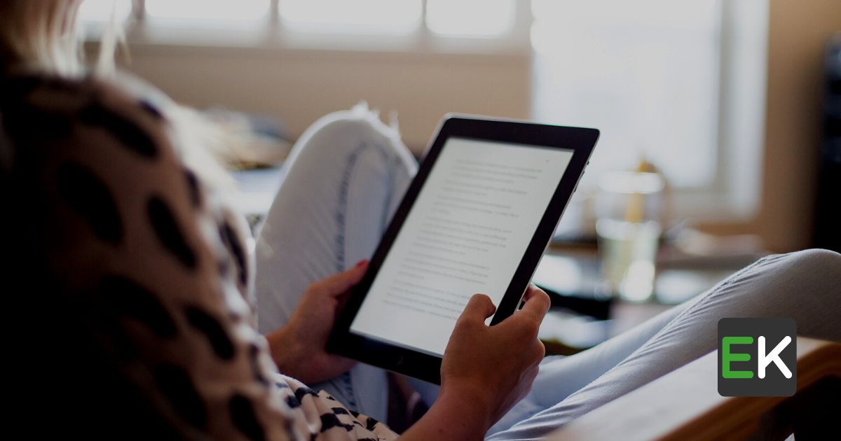 Girl reading an E-book on Kindle 