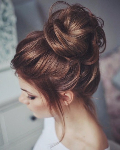 Messy High Bun Hairstyle For Women